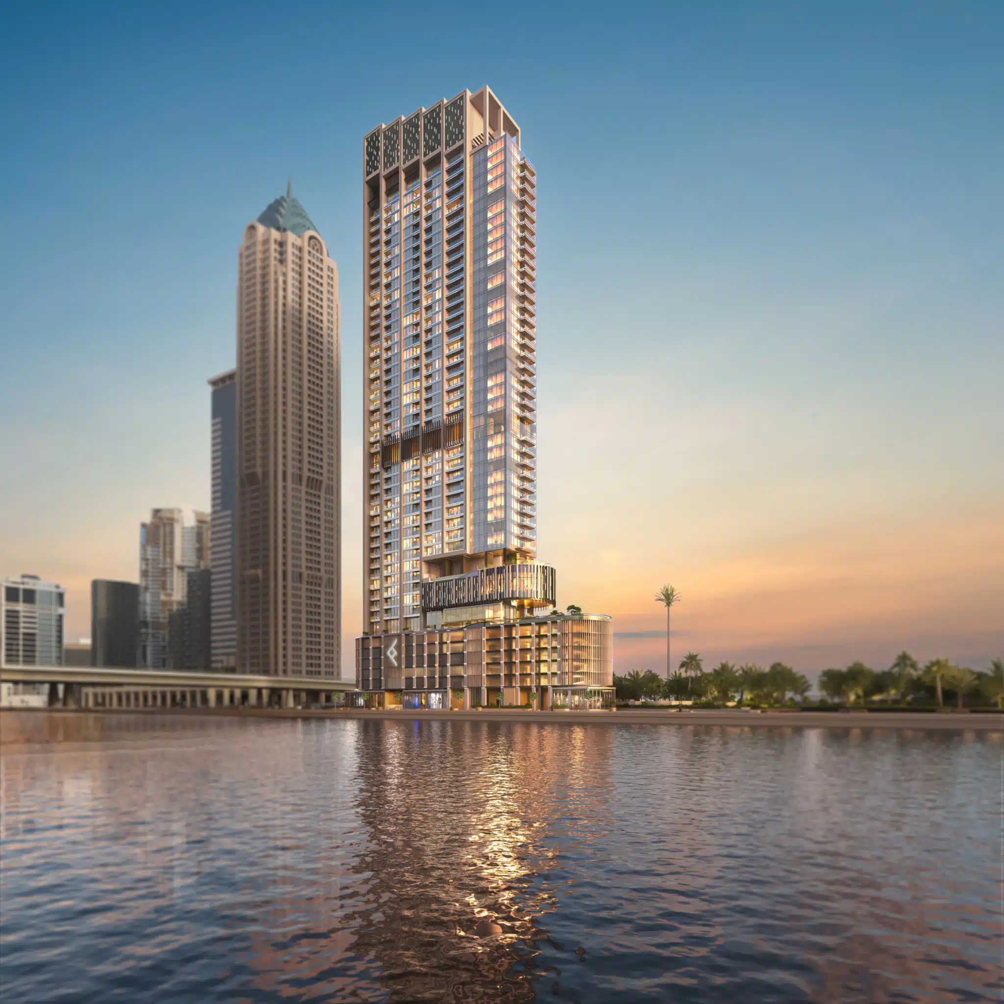 Modern 45-story One River Point tower by Ellington overlooking Dubai Water Canal with luxury apartments and infinity pools

