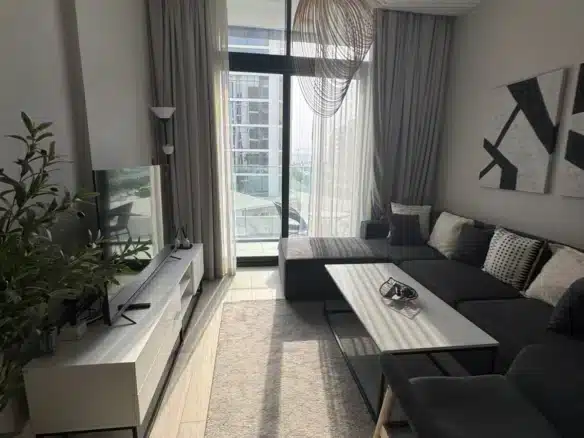 Modern 1-bedroom apartment for rent in Azizi Riviera, MBR City – 476 sq.ft with balcony and parking, AED 80,000 annually